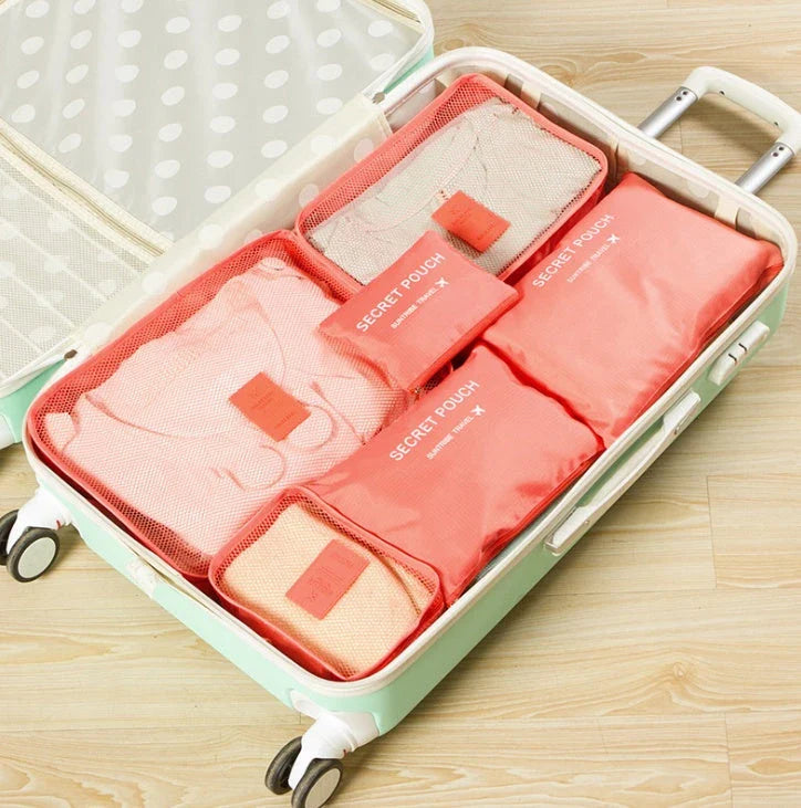 Durable waterproof packing cubes in various colors for organized, efficient travel