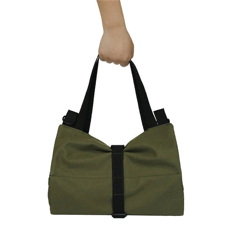 Car seat back tool organiser in camouflage Oxford cloth with five zippered pockets rolled up