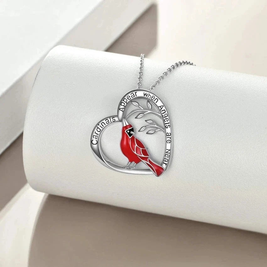 Heart shaped cardinal pendant necklace with silver water wave chain
