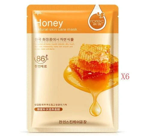 Aloe vera sheet mask on face showing 30g serum content and pre-cut eye and mouth openings
