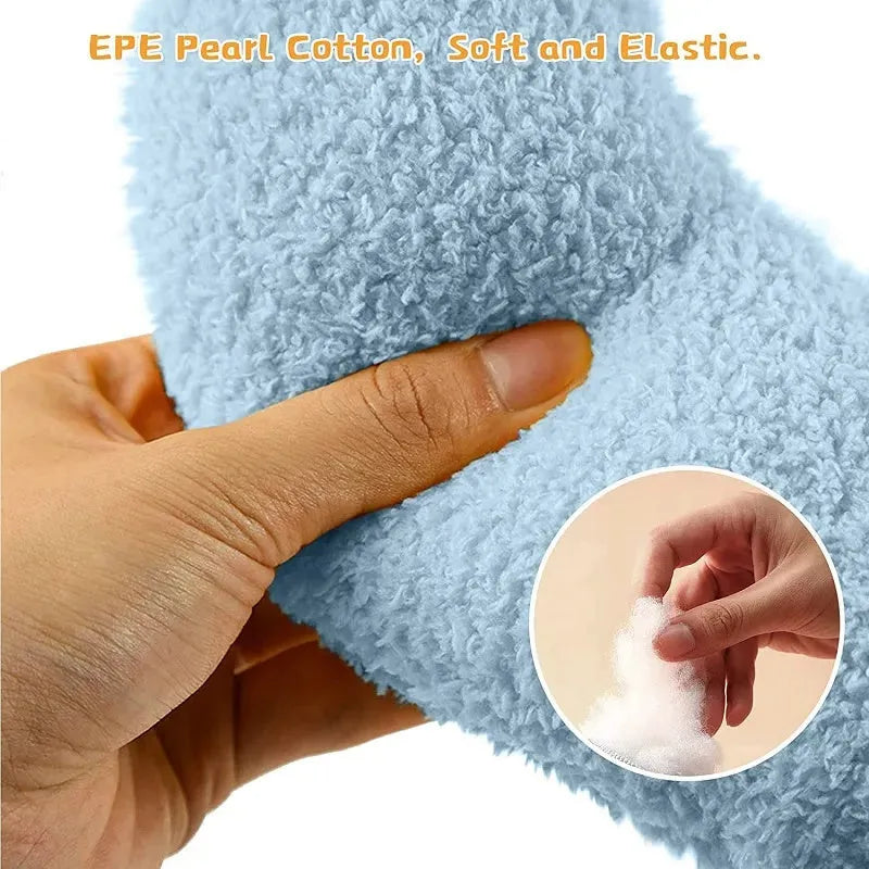 A small blue U-shaped plush pillow for a cat or small dog to sleep in.