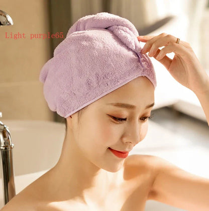 Absorbent microfiber hair turban in various vibrant colours, designed for fast and convenient drying