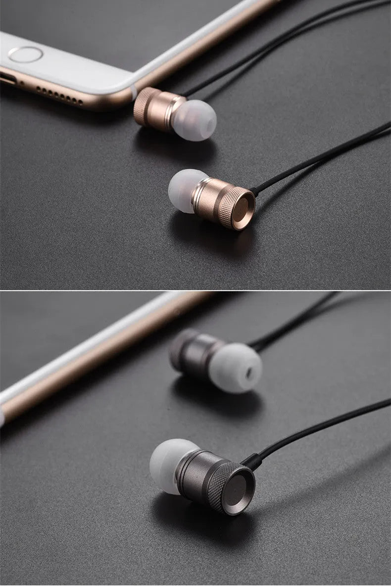Black, gold, pink, and silver in-ear headphones with TPE cable