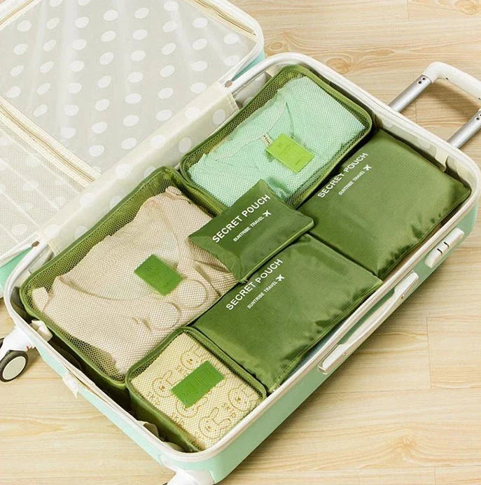 Durable waterproof packing cubes in various colors for organized, efficient travel