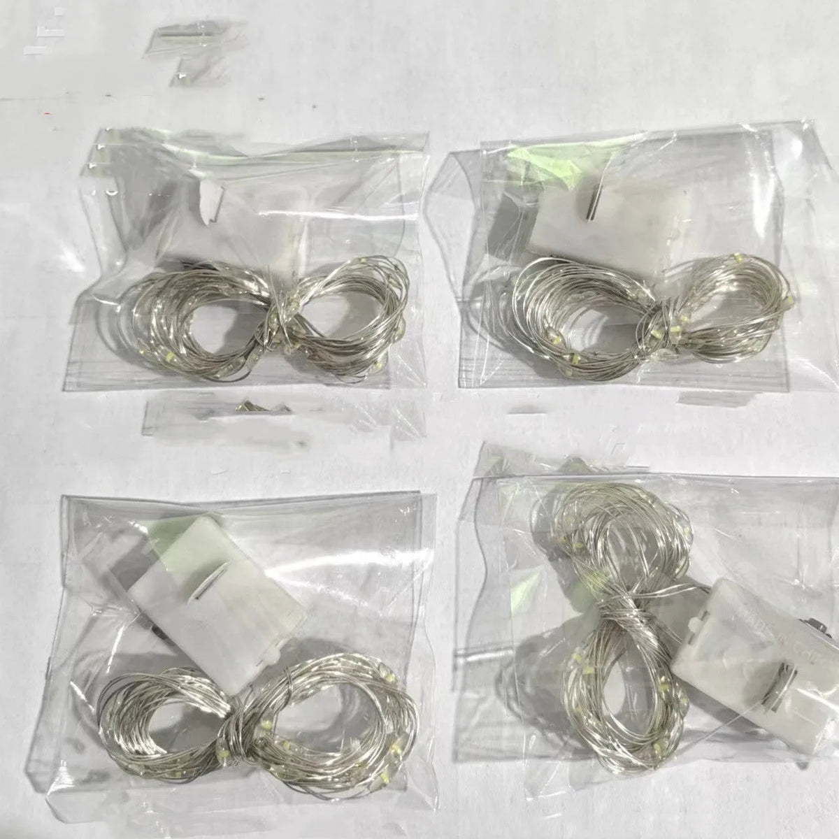 LED copper wire light set 0.2m with four warm white lights three-gear button battery powered