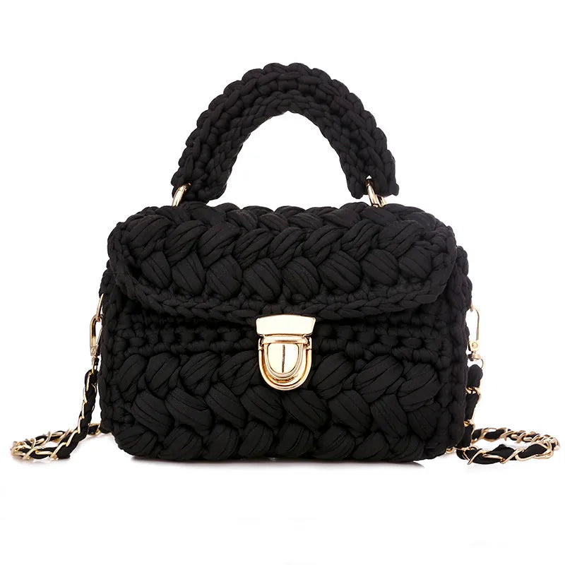 Hand knitted crochet cotton tote crossbody bag in Cotton Candy colour, horizontal square shape with lock closure and shoulder strap.
