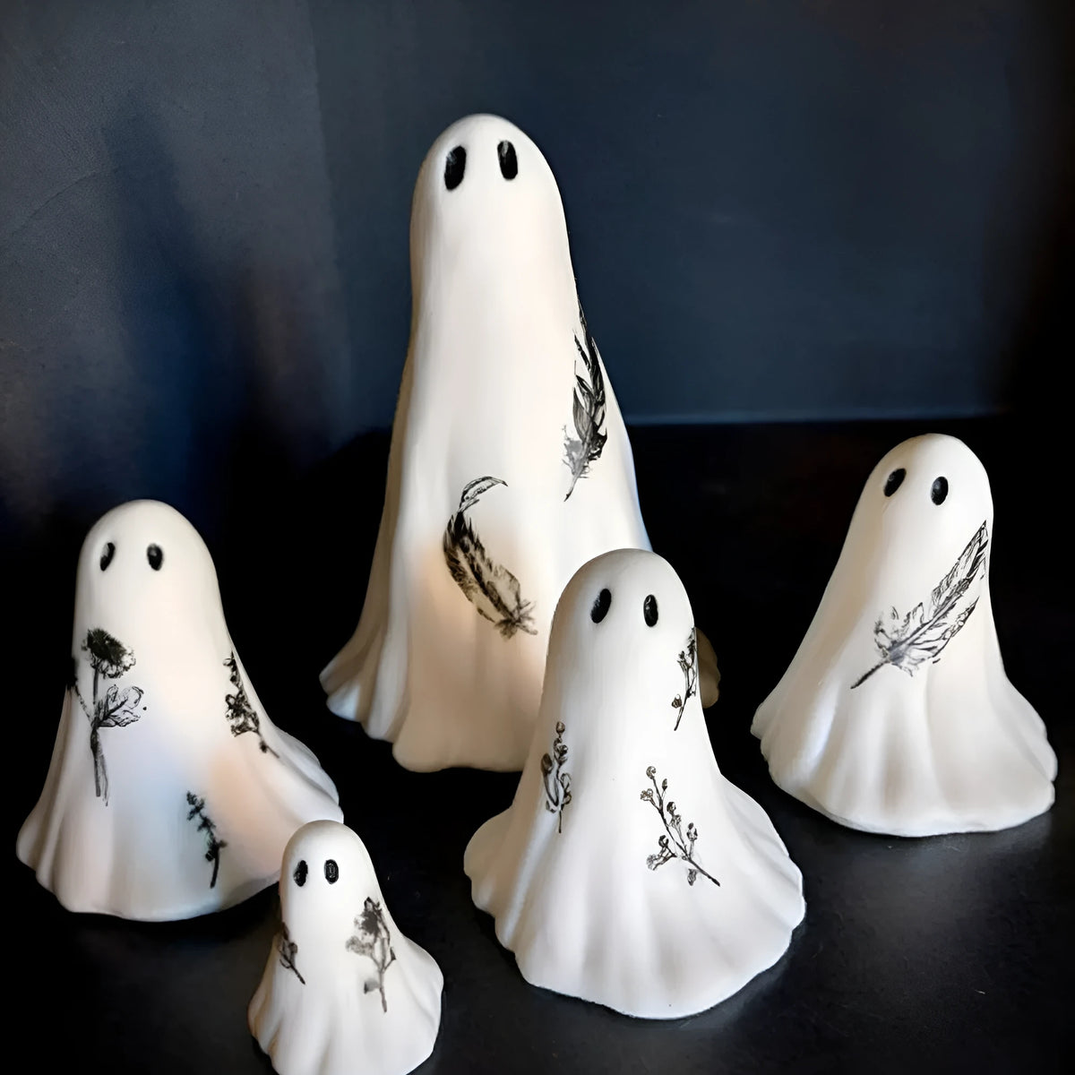 White synthetic resin ghost ornament set in multiple sizes for Halloween decoration