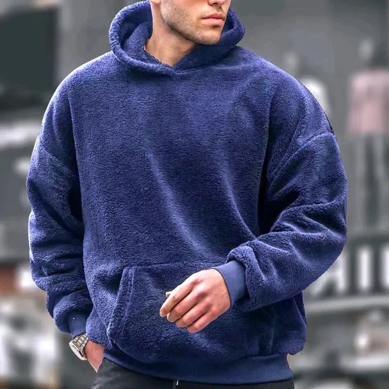 Men's fleece-lined lamb wool hooded sweater in black, front view, with hood and patch pockets