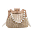 Women's woven straw shoulder bag with pearl chain detail, shown in beige, featuring internal organiser pockets.
