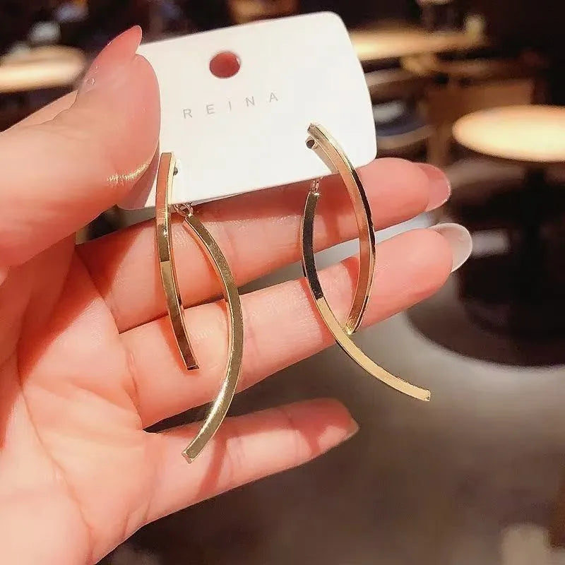 Fashion minimalist cross line gold tassel earrings for women in lightweight zinc alloy geometric style