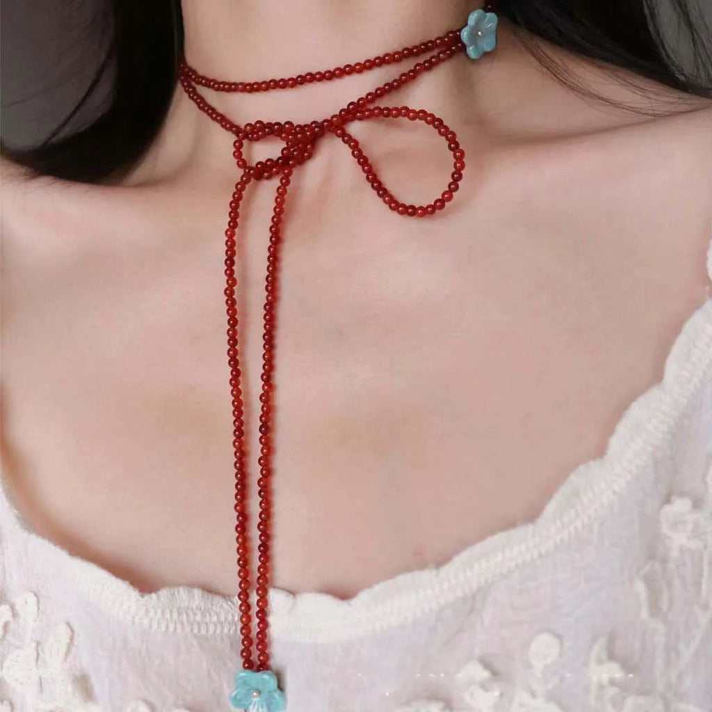 Red agate beaded necklace with acrylic geometric pendant and regular chain