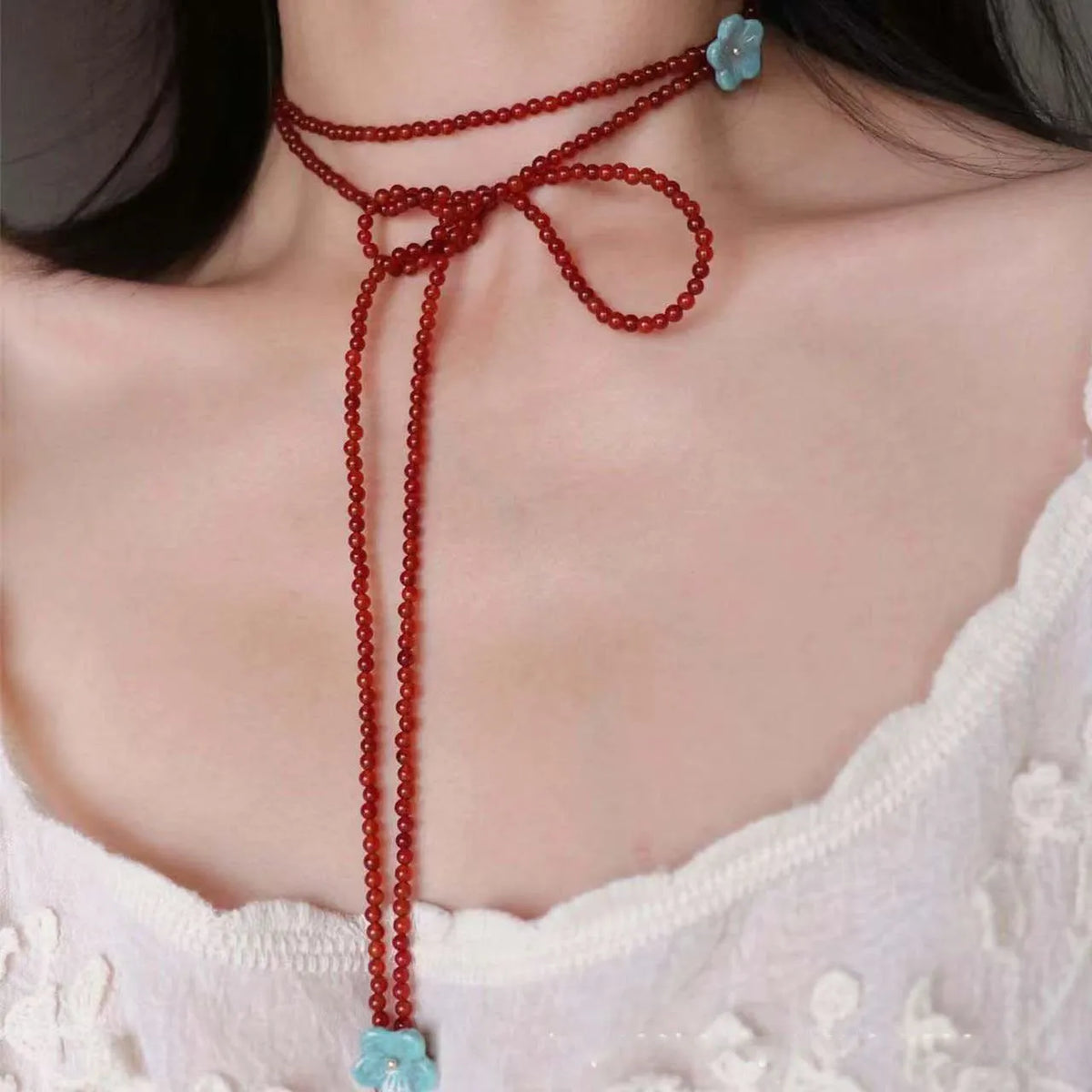 Red agate beaded necklace with acrylic geometric pendant and regular chain