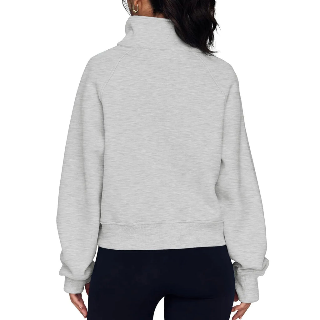 Women's loose lapel fleece-lined sweater in a solid colour with long raglan sleeves.