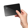 Black wireless charging pet tracker card measuring 85mm by 54mm with NFC feature and hanging hole