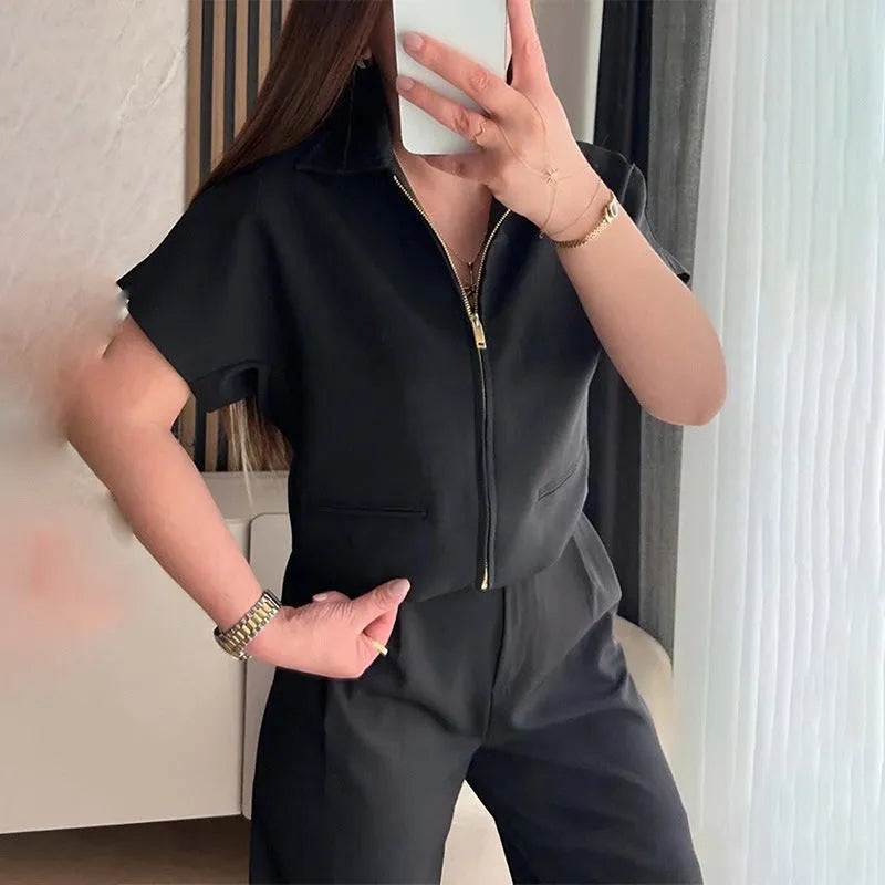 Damascus loose-fit short sleeve polyester top on a hanger in black, white, and yellow colour options.