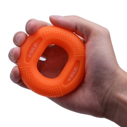 Adjustable silicone grip ring in various colours for finger and forearm training