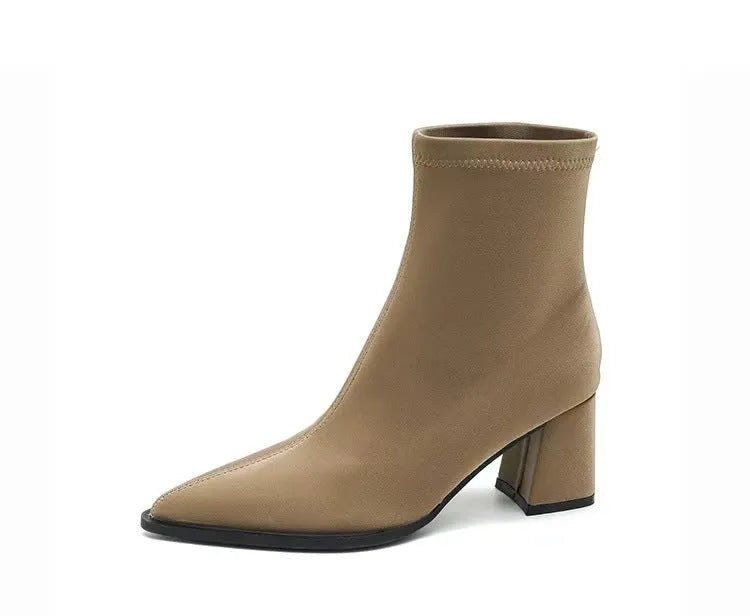 Women's khaki pointed-toe ankle boots with a wedge heel on a rubber sole.