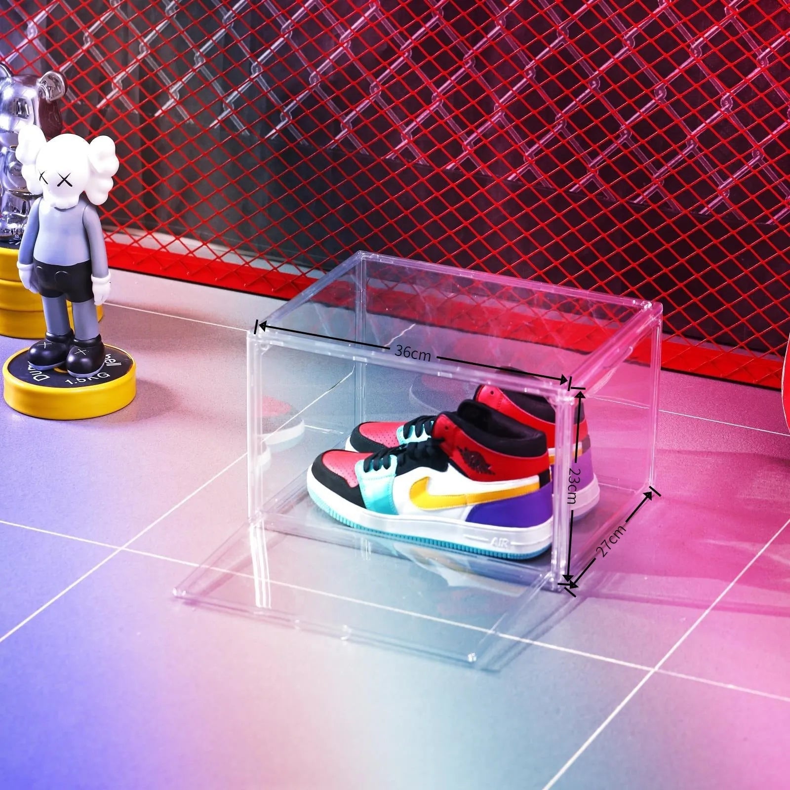 Transparent acrylic shoe storage box with magnetic side door showing shoe inside
