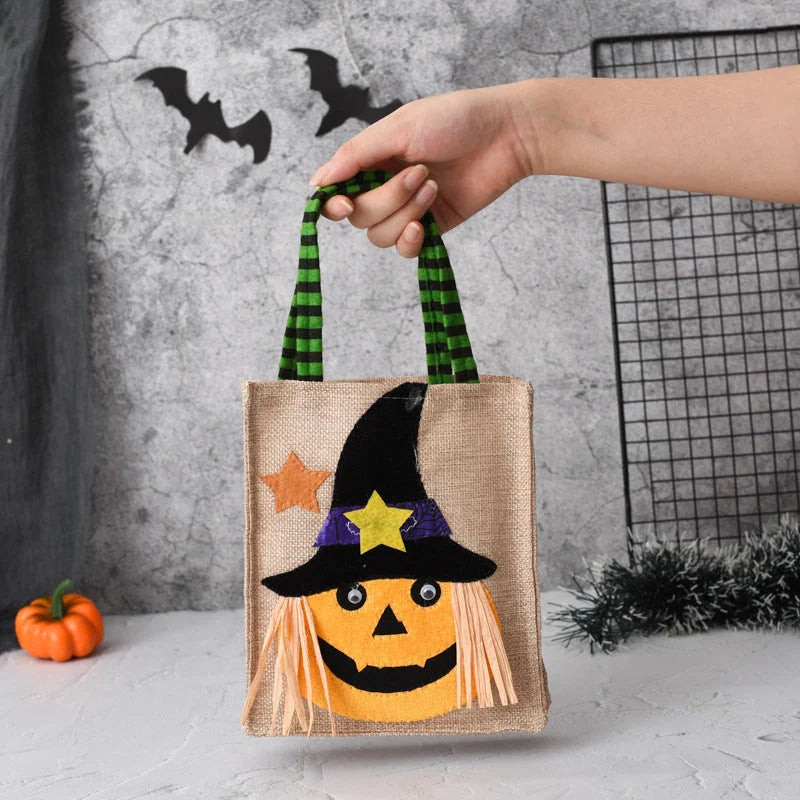 Halloween candy tote bag for kids featuring fun witch, skull, pumpkin, and black cat designs