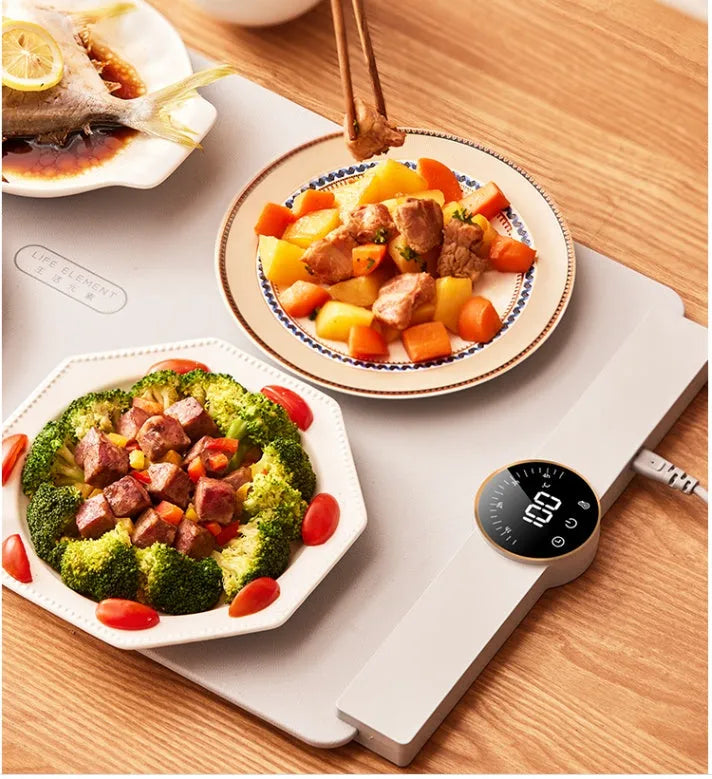 Elegant grey silicone flexible foldable electric warm chopping board with digital display on a kitchen counter