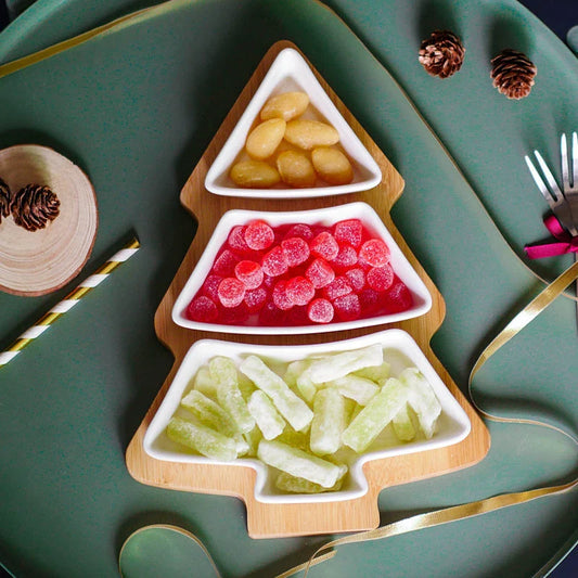 4-piece set of Christmas tree-themed ceramic plates in white and pink colors, perfect for holiday dining and entertaining