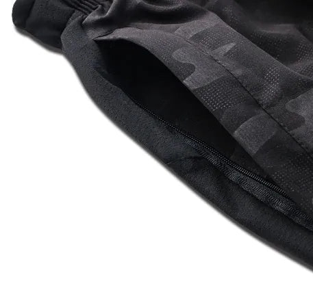 Men's reflective basketball shorts in camouflage and stripes pattern, black colour, polyester fibre