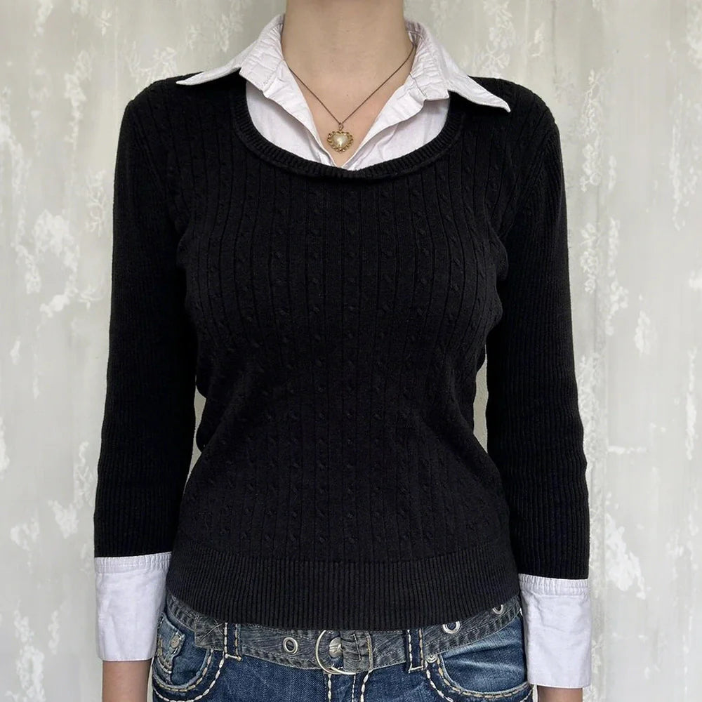 Black solid colour women's viscose pullover top showing front view with pullover styling