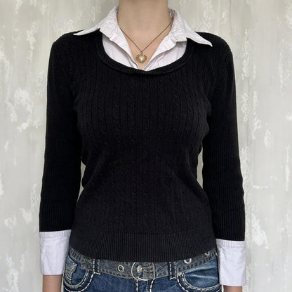 Black solid colour women's viscose pullover top showing front view with pullover styling