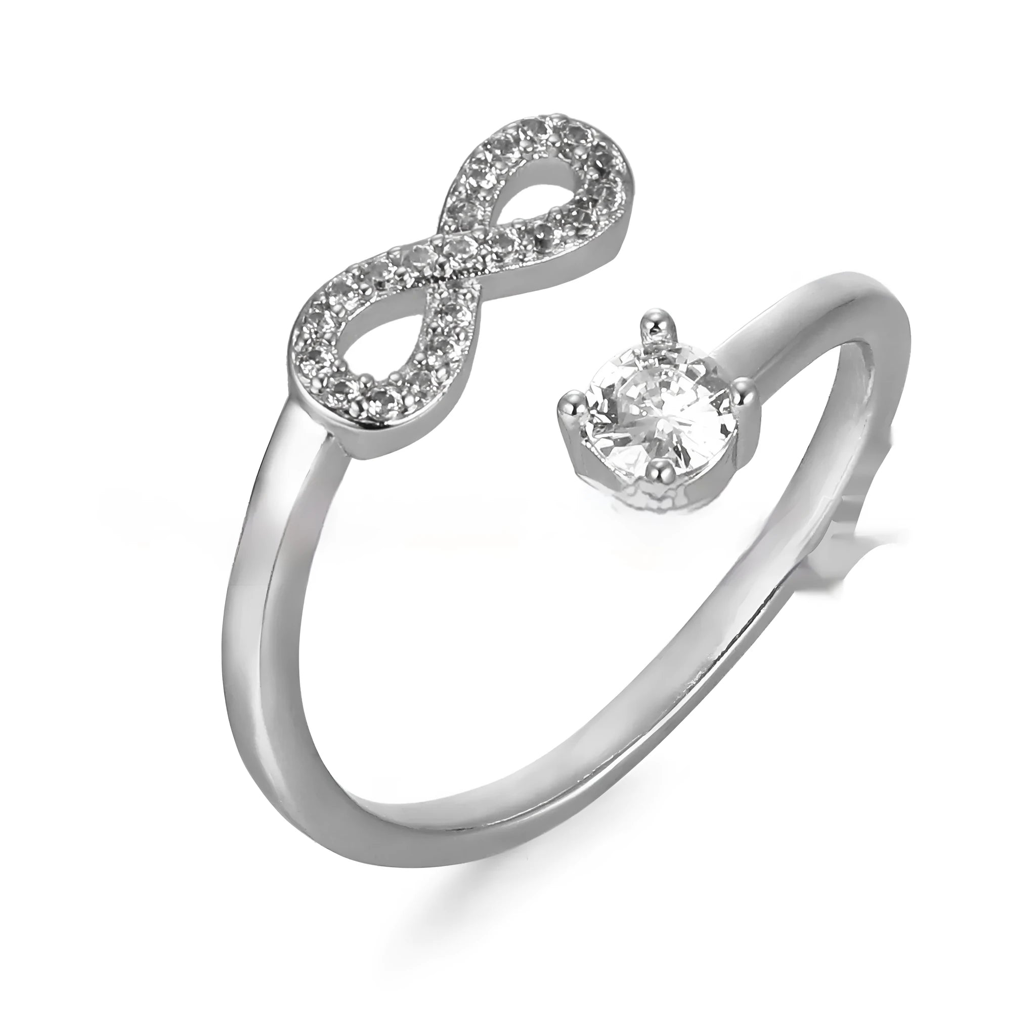 Open geometric ring with an inlaid zircon stone forming a letter, shown in gold, rose gold, and silver finishes.