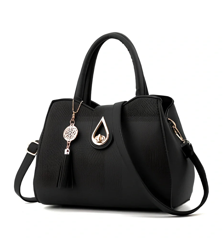 Women's litchi pattern PU leather tote bag with zipper closure and adjustable shoulder strap showing internal pockets