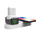 Black and white W3 three-in-one wireless charging station for Apple iPhone, Watch and AirPods on a desk.