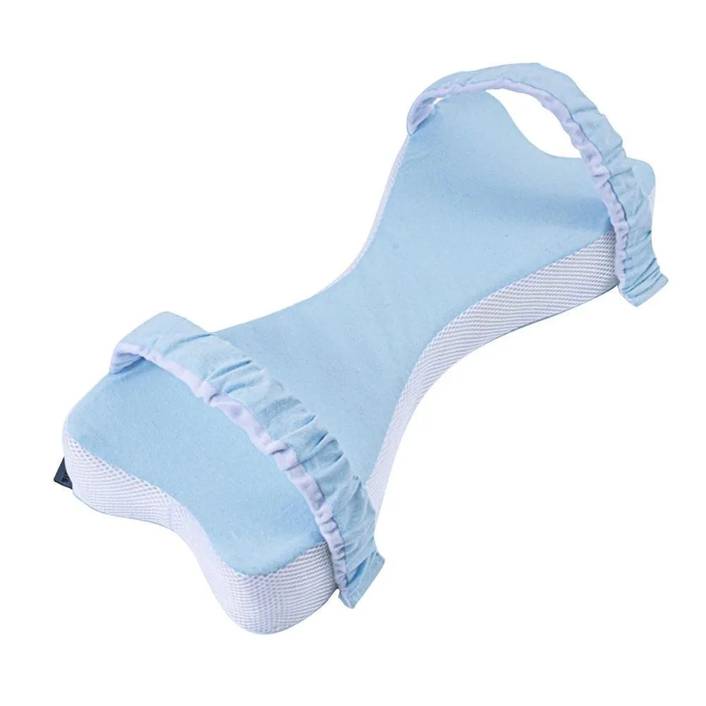 Memory cotton knee pillow in light blue on a bed, size 70x37x9cm for side sleeping support