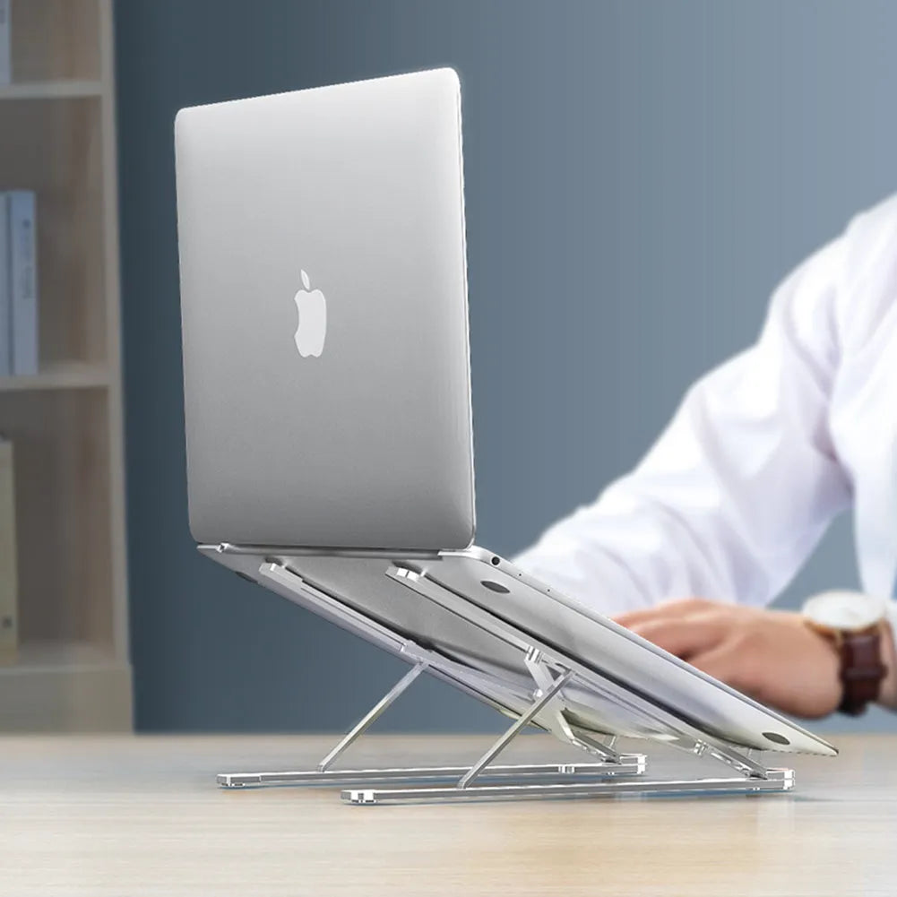 Foldable aluminium laptop stand in silver colour supporting a laptop, shown in open and closed positions.