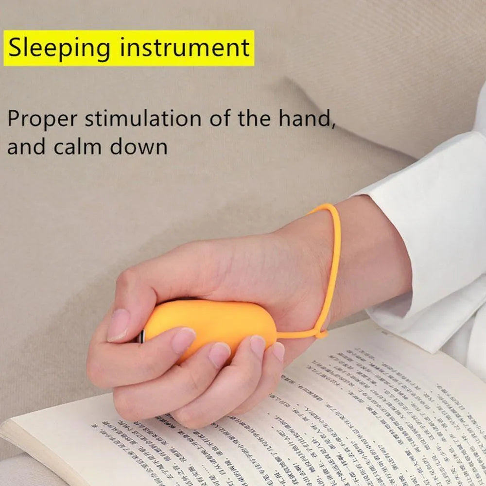 Handheld micro-current sleep aid device with round button and USB charging port