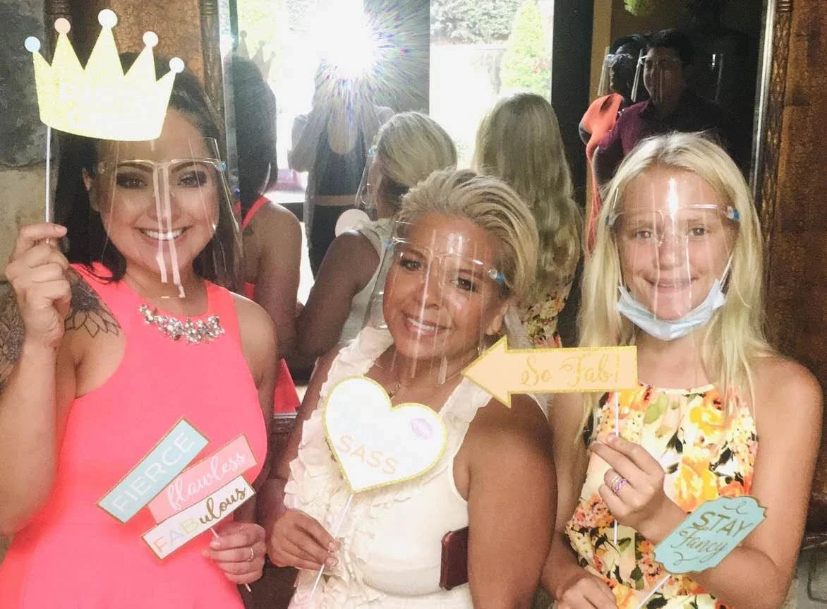 Head-mounted anti-fog and anti-spray mask in blue, green, and pink with replaceable lenses