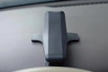 Black G-40 car bracket attached to steering wheel holding a mobile phone for navigation