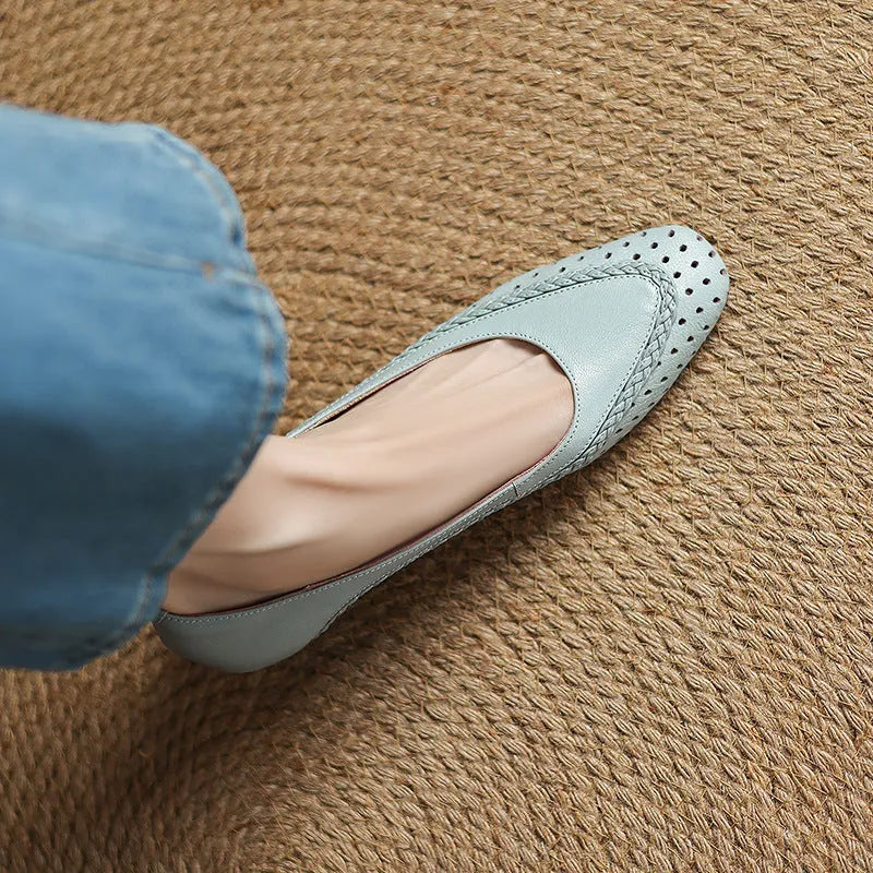 Women's plus size light blue sandals with hollow-out design and mid heel.