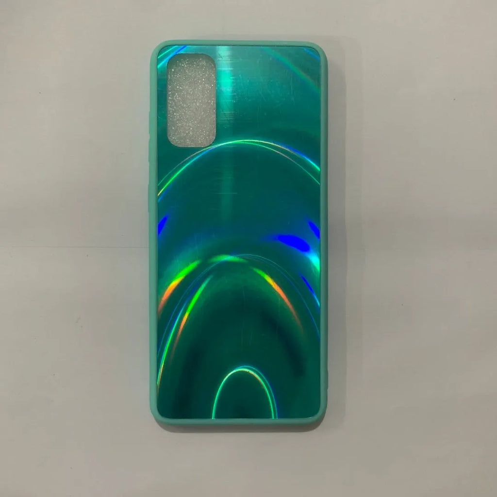 Marble pattern silicone phone case for Samsung Galaxy smartphone on a table.