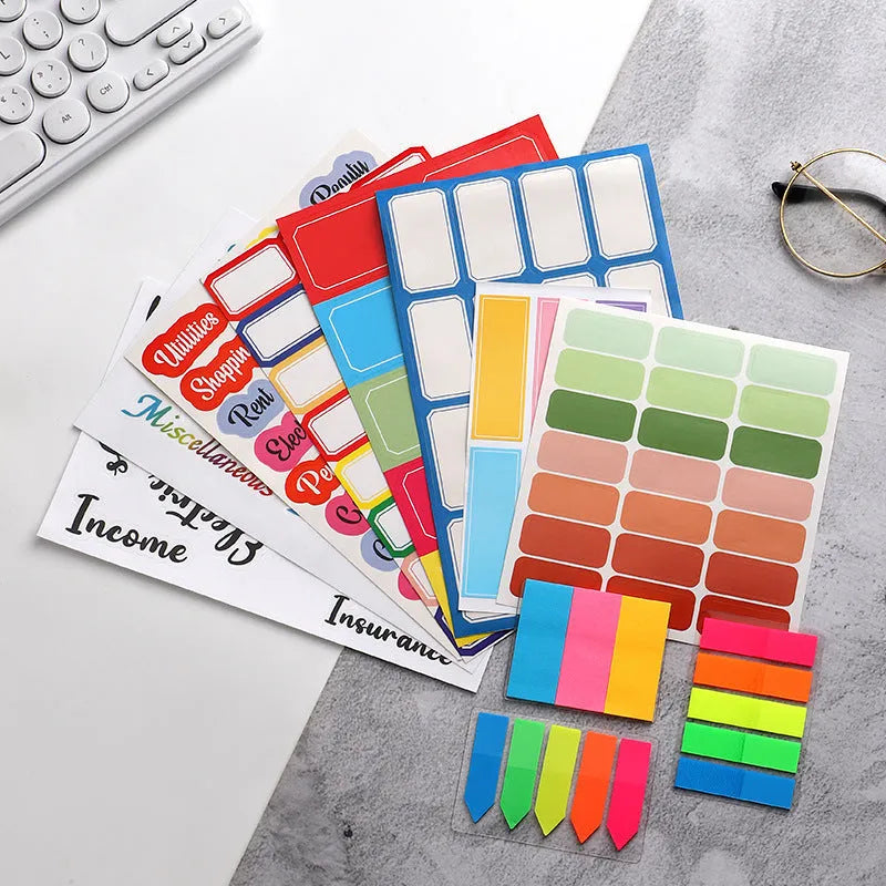Handwritten label stickers showing 16-grid blue, 21-grid, and 24-grid adhesive designs for organisation