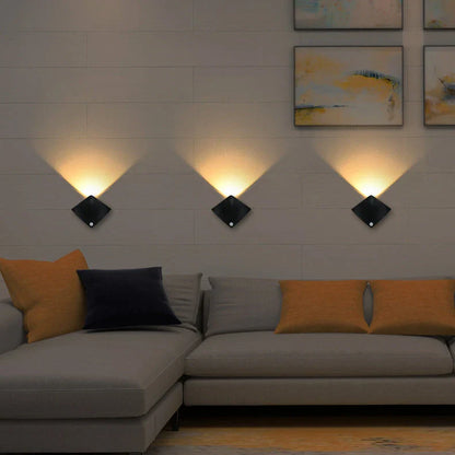 Wireless motion-activated LED wall light with various lighting color and power source options for home decor