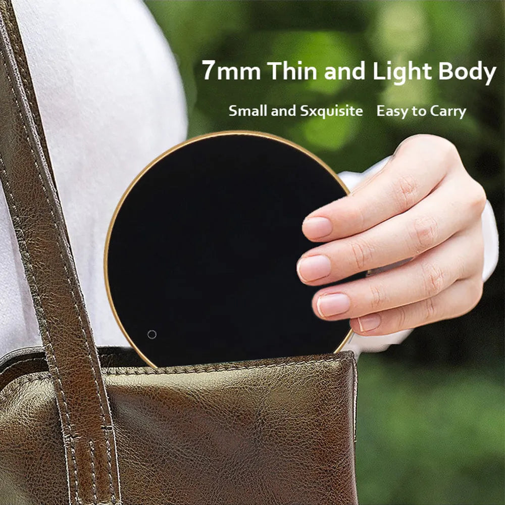 Black USB heating coaster with temperature adjustment buttons for warming coffee and tea mugs