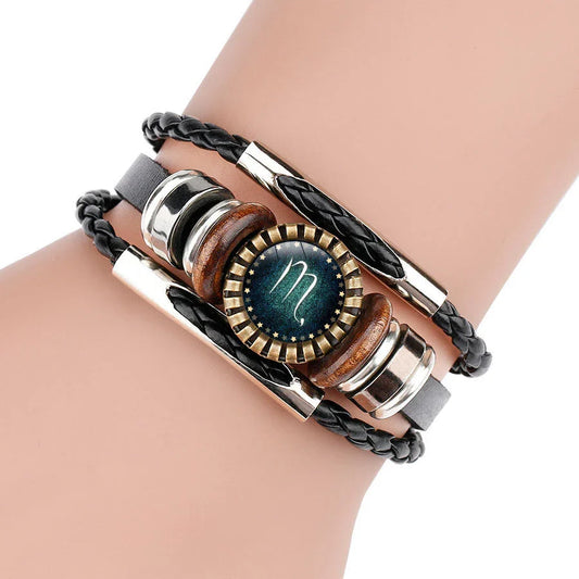 Multilayer leather bracelet with glass art depicting 12 zodiac signs, a stylish and captivating celestial accessory