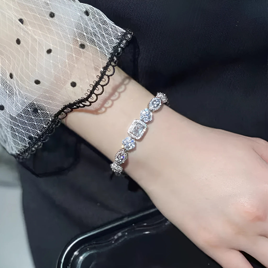 Women's silver-plated bracelet with sparkling zircon stones in a geometry shape.
