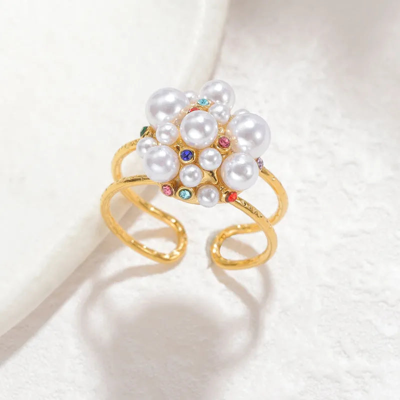 Open-mouth women's ring with pearl centre and zircon detailing on stainless steel band