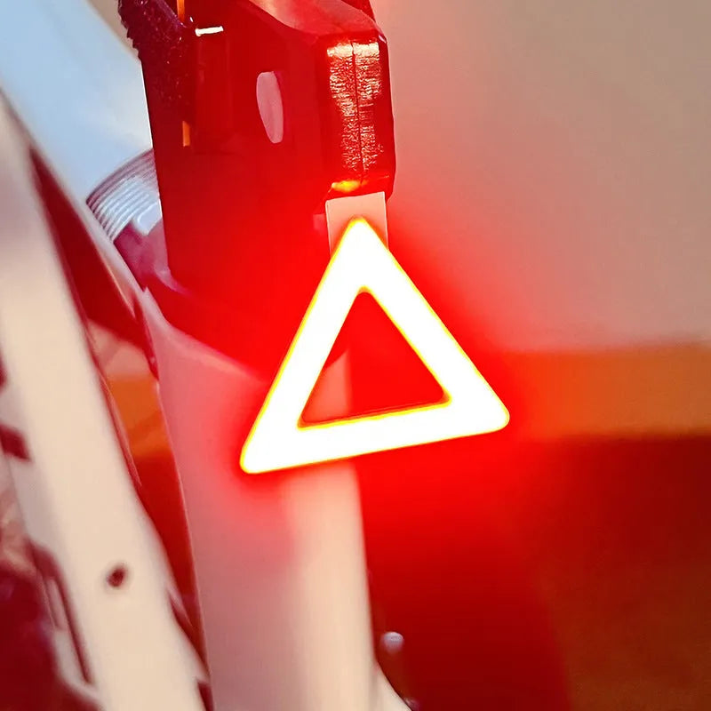 Rechargeable cartoon bicycle taillight in flower shape with flashing two-colour LEDs