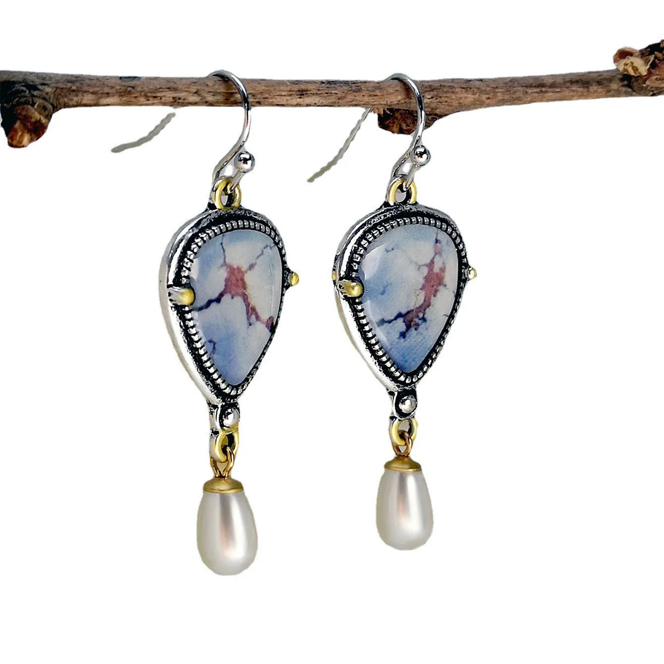 Retro blue women's drop earrings with synthetic opal, pearl, and geometric metalwork.