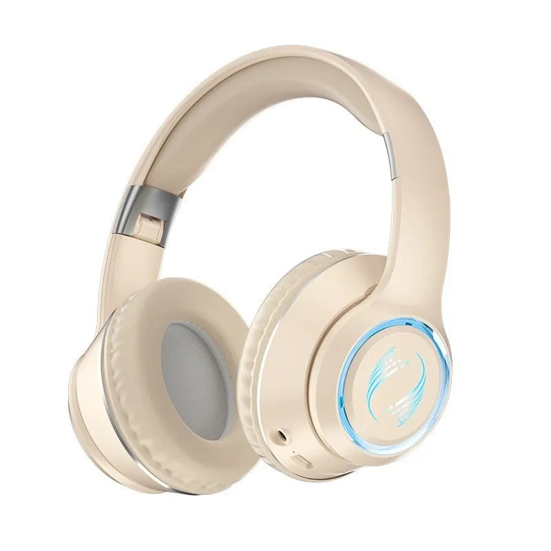 Wireless Bluetooth gaming headset with subwoofer, noise reduction, and breathing light in black colour on a desk.