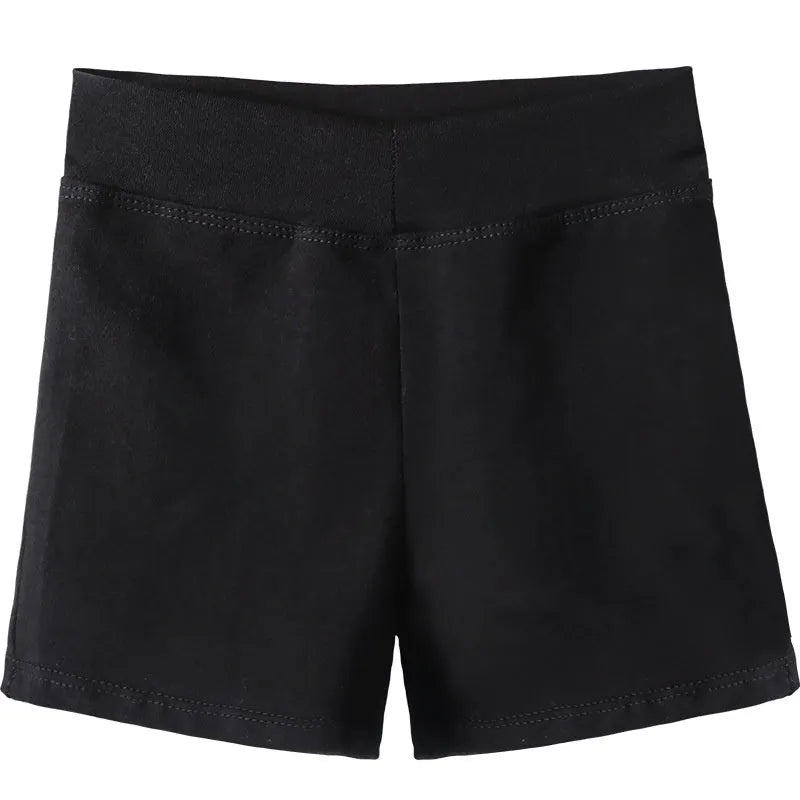 Black cotton women's dance practice trousers laid flat, showing solid colour and simple design.
