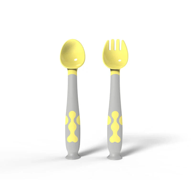 Training Twisting Spoon Fork Set for babies in blue, purple, pink, and yellow
