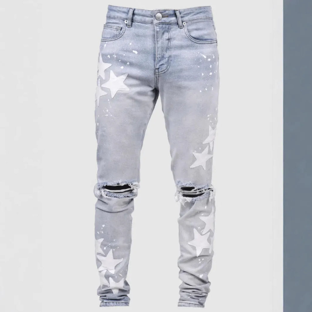 Men's slim stretch blue jeans with embroidery detailing on denim fabric